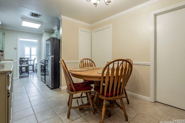 322 Pool, San Antonio, TX 78223 - dining space with crown molding, light tile patterned flooring, and baseboards