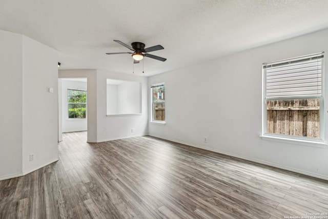 87 Kenrock Rdg, San Antonio, TX 78254 - unfurnished room with ceiling fan, wood finished floors, and baseboards