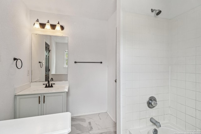 87 Kenrock Rdg, San Antonio, TX 78254 - bathroom with vanity, marble look tile flooring, washtub / shower combination, and baseboards