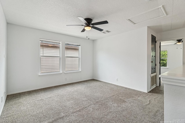 87 Kenrock Rdg, San Antonio, TX 78254 - carpeted empty room with a ceiling fan, a textured ceiling, and baseboards