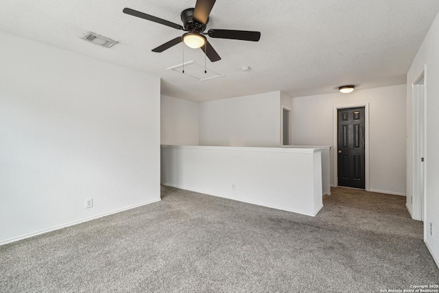 87 Kenrock Rdg, San Antonio, TX 78254 - empty room with ceiling fan, carpet flooring, attic access, and baseboards