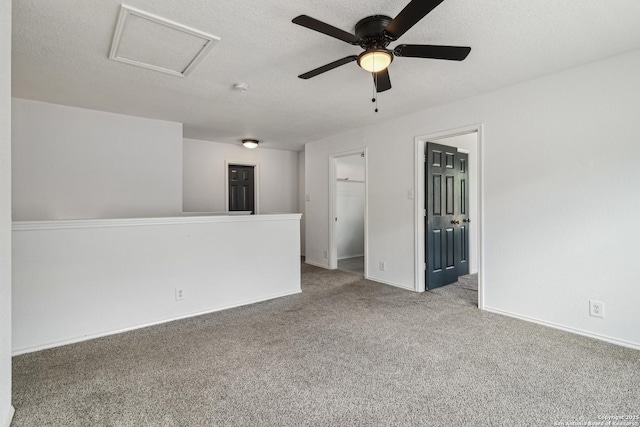 87 Kenrock Rdg, San Antonio, TX 78254 - unfurnished room featuring carpet flooring, attic access, baseboards, ceiling fan, and a smoke detector