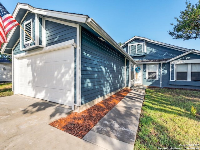 7363 Longing Trl, San Antonio, TX 78244 - view of front of property with a garage and a front yard