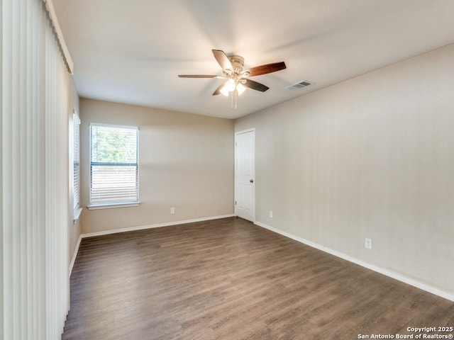 7363 Longing Trl, San Antonio, TX 78244 - unfurnished room with a ceiling fan, wood finished floors, and baseboards