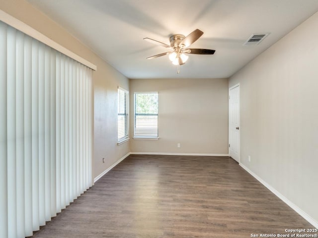 7363 Longing Trl, San Antonio, TX 78244 - spare room with a ceiling fan, wood finished floors, and baseboards