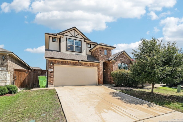 9010 La Junta, San Antonio, TX 78254 - view of front facade featuring brick siding, driveway, a garage, and stucco siding