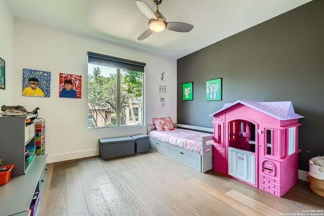 7 Saxby Gln, San Antonio, TX 78257 - bedroom featuring wood finished floors, baseboards, and ceiling fan
