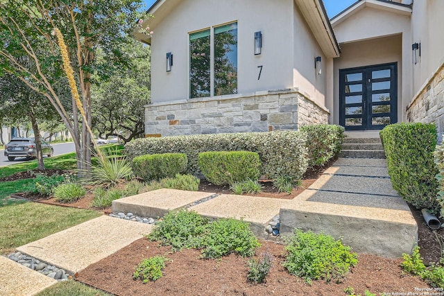 7 Saxby Gln, San Antonio, TX 78257 - view of front of house featuring stone siding and stucco siding