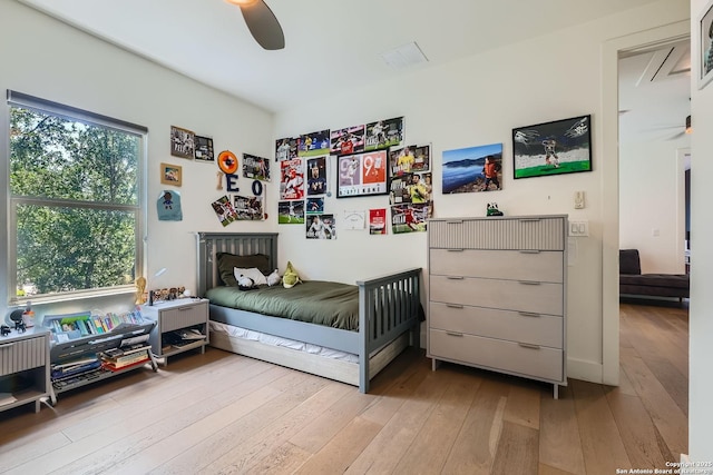 7 Saxby Gln, San Antonio, TX 78257 - bedroom featuring wood-type flooring and ceiling fan