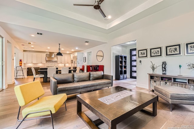 7 Saxby Gln, San Antonio, TX 78257 - living room with a ceiling fan, light wood-style floors, recessed lighting, and baseboards