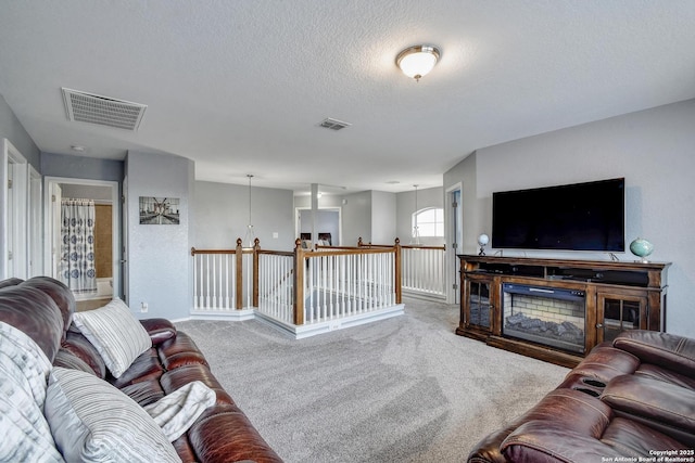12535 Panola Way, San Antonio, TX 78253 - carpeted living room with a textured ceiling and baseboards