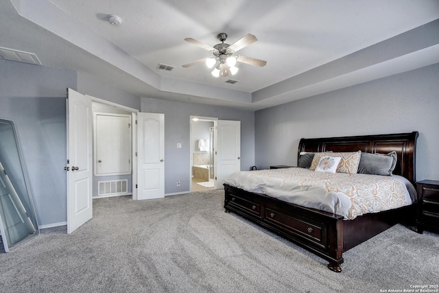 12535 Panola Way, San Antonio, TX 78253 - carpeted bedroom with baseboards, ensuite bathroom, and ceiling fan