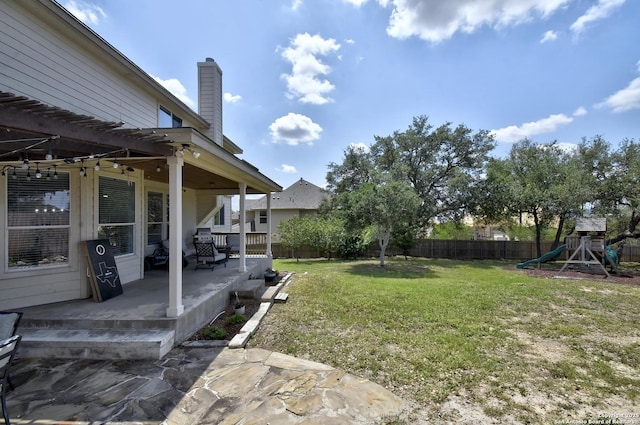 12535 Panola Way, San Antonio, TX 78253 - view of yard featuring a patio and a playground