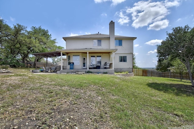 12535 Panola Way, San Antonio, TX 78253 - back of house featuring a patio area and a chimney