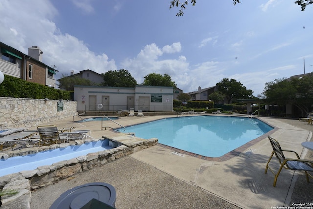 12610 Uhr Ln Unit 281, San Antonio, TX 78217 - community pool featuring a patio