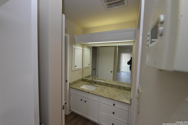 12610 Uhr Ln Unit 281, San Antonio, TX 78217 - bathroom featuring vanity and wood finished floors