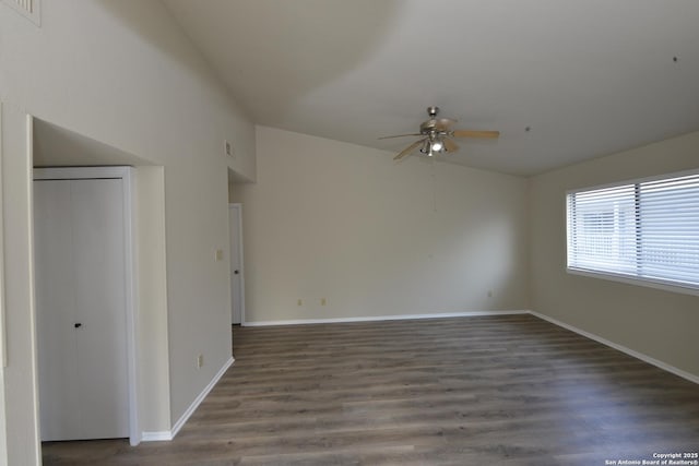 12610 Uhr Ln Unit 281, San Antonio, TX 78217 - unfurnished bedroom featuring wood finished floors, baseboards, and vaulted ceiling