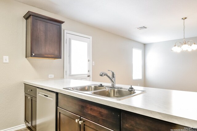 202 Reuben Kemper, San Antonio, TX 78220 - kitchen with dishwasher, a sink, dark brown cabinets, and light countertops