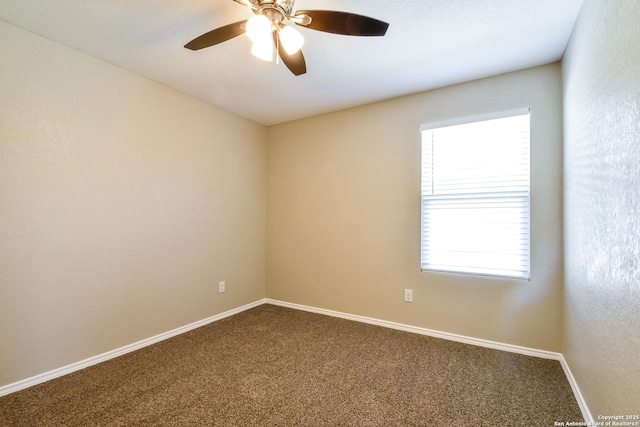 202 Reuben Kemper, San Antonio, TX 78220 - spare room featuring dark colored carpet, baseboards, and a ceiling fan