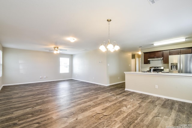 202 Reuben Kemper, San Antonio, TX 78220 - kitchen featuring stainless steel appliances, dark brown cabinetry, under cabinet range hood, dark wood finished floors, and a ceiling fan