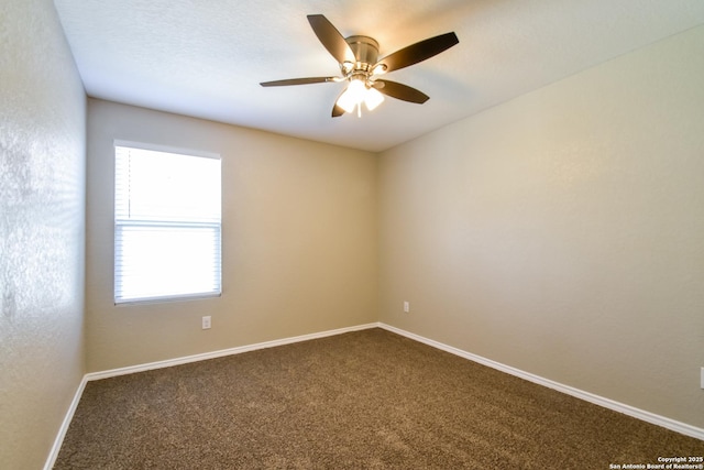 202 Reuben Kemper, San Antonio, TX 78220 - unfurnished room with dark colored carpet, baseboards, and a ceiling fan