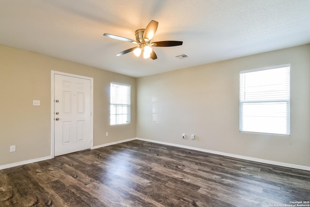 202 Reuben Kemper, San Antonio, TX 78220 - spare room featuring ceiling fan, dark wood-style floors, and baseboards