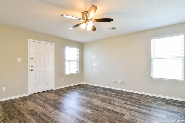 202 Reuben Kemper, San Antonio, TX 78220 - spare room featuring ceiling fan, dark wood-style floors, and baseboards