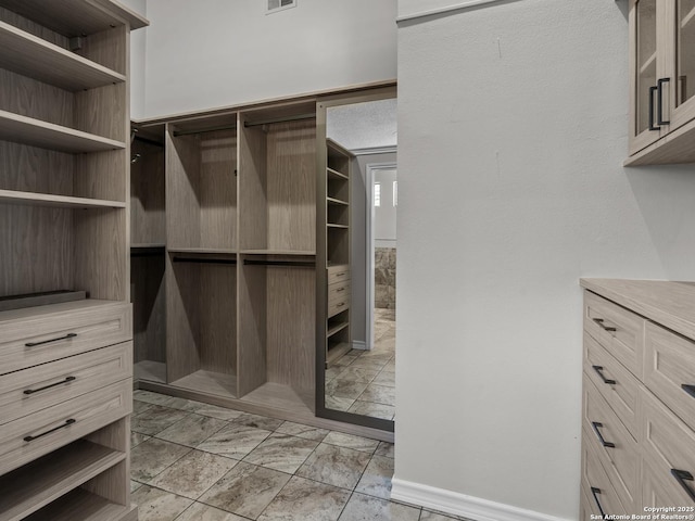 16 Cheshire, San Antonio, TX 78218 - spacious closet featuring light marble finish floors
