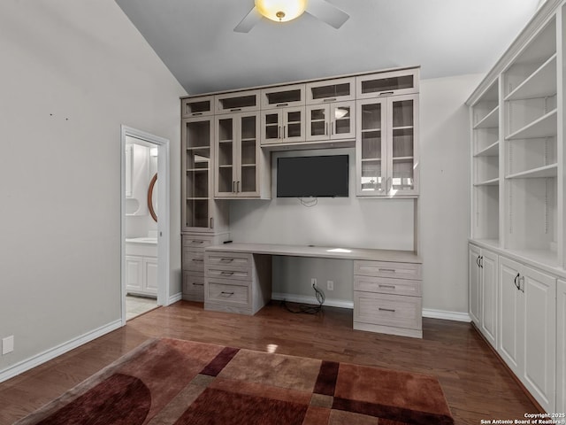 16 Cheshire, San Antonio, TX 78218 - unfurnished office featuring ceiling fan, dark wood-type flooring, lofted ceiling, and built in desk