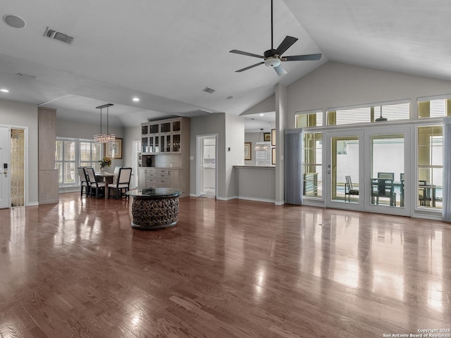 16 Cheshire, San Antonio, TX 78218 - living area with ceiling fan, wood finished floors, high vaulted ceiling, baseboards, and recessed lighting