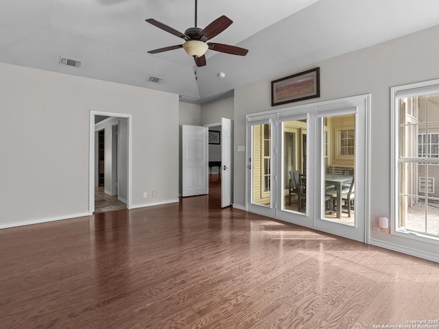16 Cheshire, San Antonio, TX 78218 - unfurnished room with plenty of natural light, ceiling fan, wood finished floors, baseboards, and vaulted ceiling