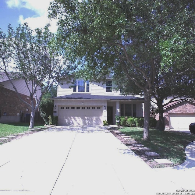 12115 Redbud Leaf, San Antonio, TX 78253 - traditional-style home with an attached garage and driveway