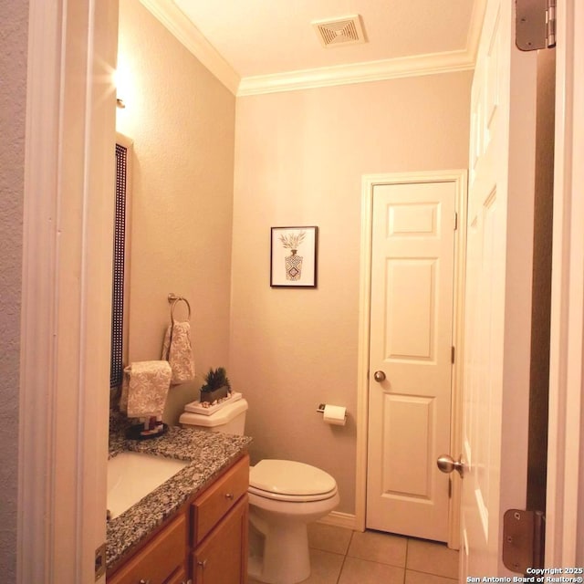 12115 Redbud Leaf, San Antonio, TX 78253 - bathroom with vanity, tile patterned floors, toilet, and crown molding