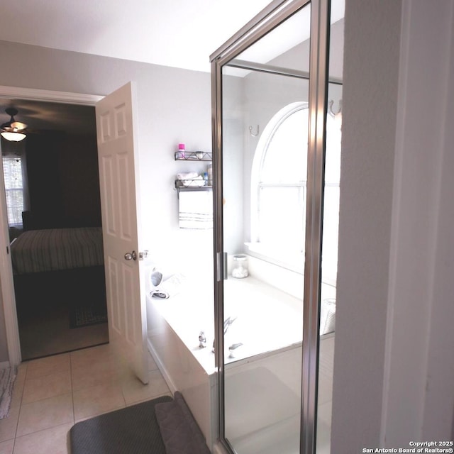 12115 Redbud Leaf, San Antonio, TX 78253 - bathroom featuring ensuite bath, tile patterned floors, ceiling fan, and a garden tub