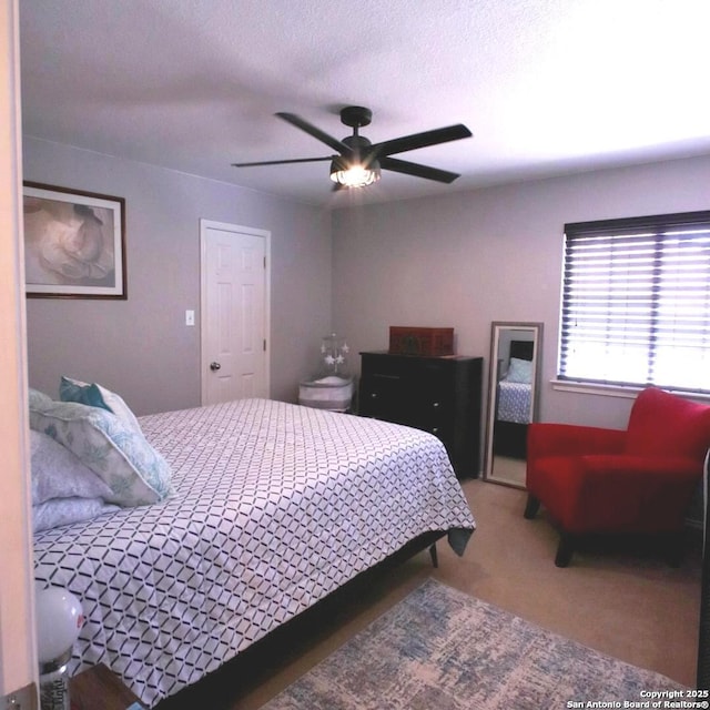 12115 Redbud Leaf, San Antonio, TX 78253 - bedroom featuring carpet and a ceiling fan