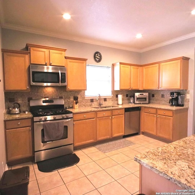 12115 Redbud Leaf, San Antonio, TX 78253 - kitchen featuring appliances with stainless steel finishes, a sink, backsplash, light tile patterned floors, and light stone counters