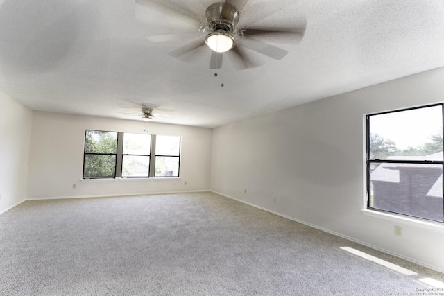 10322 Fork Crk, San Antonio, TX 78245 - carpeted empty room with baseboards and ceiling fan