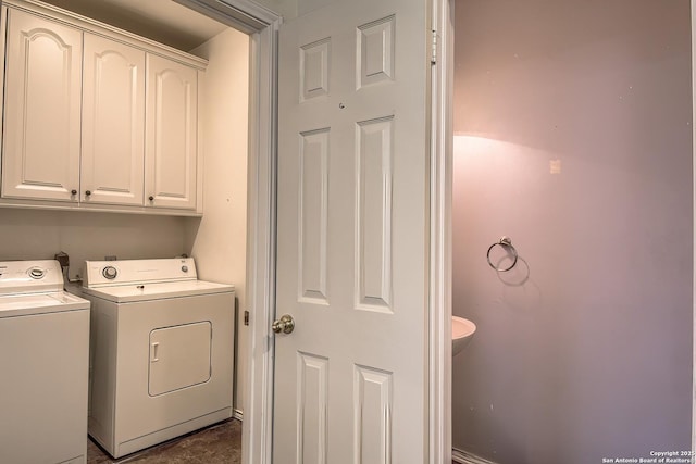 1510 Kingsbridge, San Antonio, TX 78253 - laundry area featuring separate washer and dryer, cabinet space, and baseboards