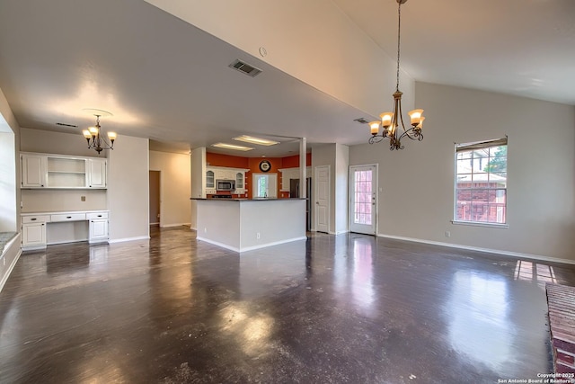 1510 Kingsbridge, San Antonio, TX 78253 - unfurnished living room featuring a chandelier, baseboards, vaulted ceiling, and concrete floors