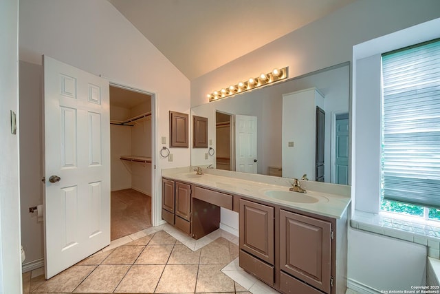 1510 Kingsbridge, San Antonio, TX 78253 - full bathroom featuring vaulted ceiling, tile patterned floors, and double vanity