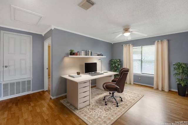 9503 Marshall Pt, San Antonio, TX 78240 - home office featuring wood finished floors, ceiling fan, baseboards, ornamental molding, and attic access
