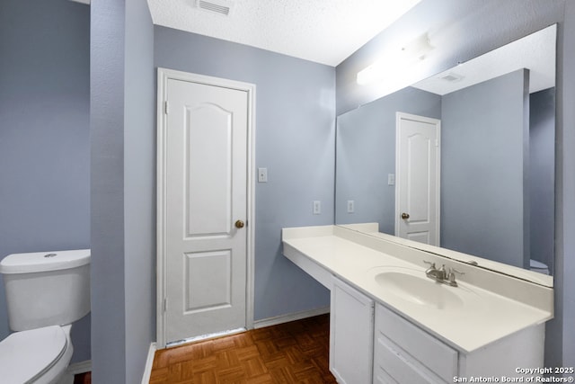 9503 Marshall Pt, San Antonio, TX 78240 - half bath featuring toilet, vanity, and baseboards