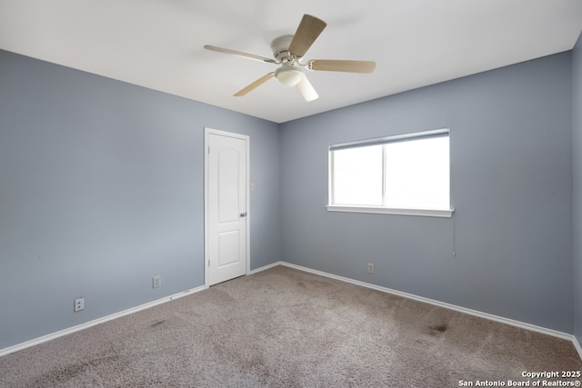 9503 Marshall Pt, San Antonio, TX 78240 - empty room with carpet, baseboards, and a ceiling fan
