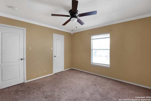 9503 Marshall Pt, San Antonio, TX 78240 - spare room with a textured ceiling, ornamental molding, carpet floors, a ceiling fan, and a smoke detector