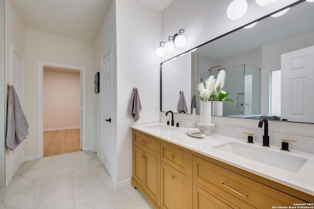 12031 Wellstone, San Antonio, TX 78249 - bathroom featuring a stall shower, double vanity, marble finish floors, and baseboards