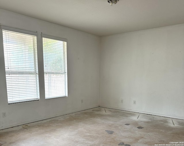 16210 Raceway Downs, Selma, TX 78154 - spare room with healthy amount of natural light and concrete floors
