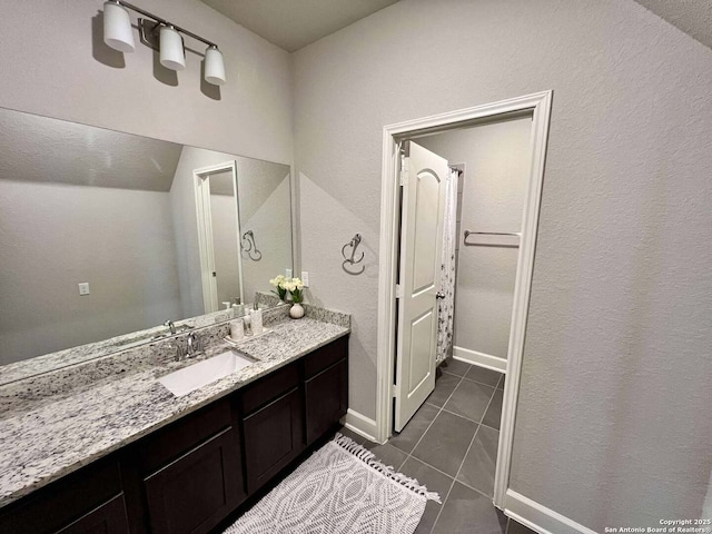 251 Burning Star Blvd, Castroville, TX 78009 - bathroom with vanity and tile patterned floors
