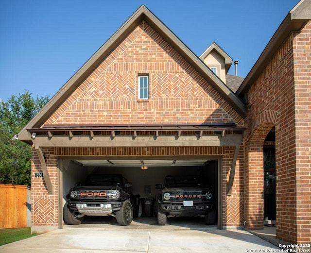251 Burning Star Blvd, Castroville, TX 78009 - view of front of house with brick siding, concrete driveway, and an attached garage