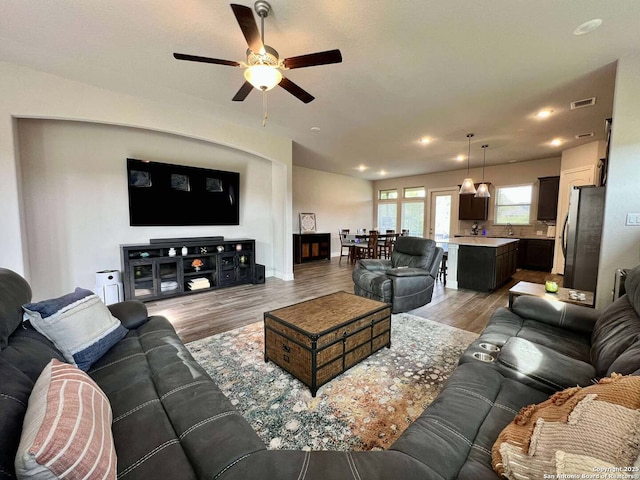 251 Burning Star Blvd, Castroville, TX 78009 - living room featuring light wood finished floors, a ceiling fan, and recessed lighting
