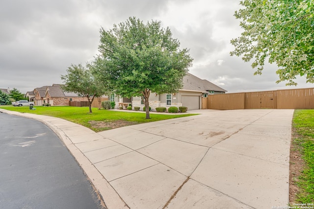 2714 Trailmont Dr, San Antonio, TX 78253 - obstructed view of property featuring an attached garage, concrete driveway, and stucco siding